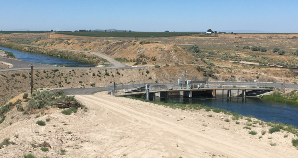 landscape shot of a bridge going over a canal